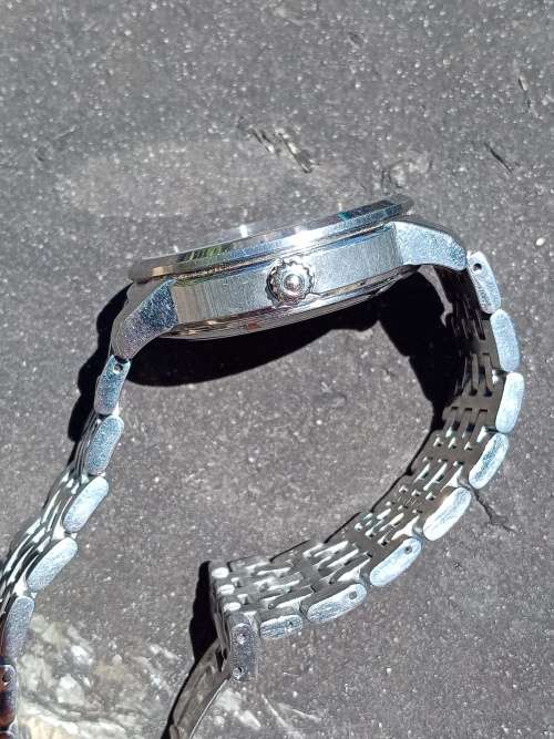 Seiko model number: 4R36 04E0 Automatic hacking and handwind 39mm ex crown