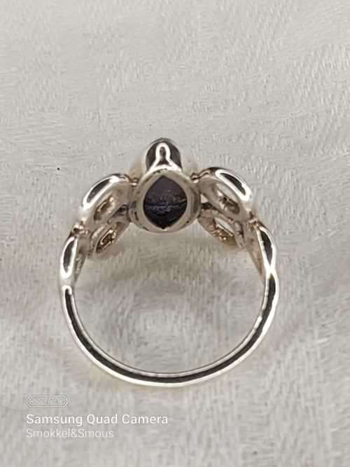 Sterling silver ladies ring with sugar lite stone Size: M.5