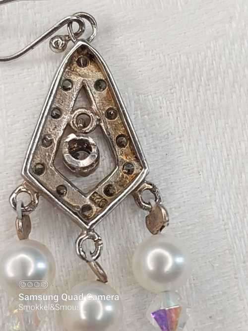 Sterling silver hook in earrings