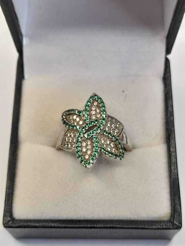 Sterling silver ladies ring Size: O.5 NO BOX
