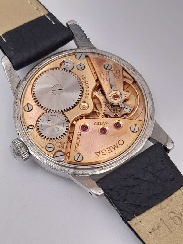 Omega REF: 2495 16 caliber 265 manual wind 33mm ex crown