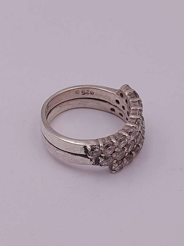 Sterling silver ladies ring unknown stone Size: P.5