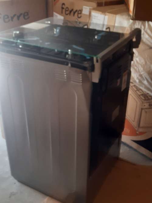 Brand new 4 Burner Gas Stove  with Gas Oven Damaged in Transit