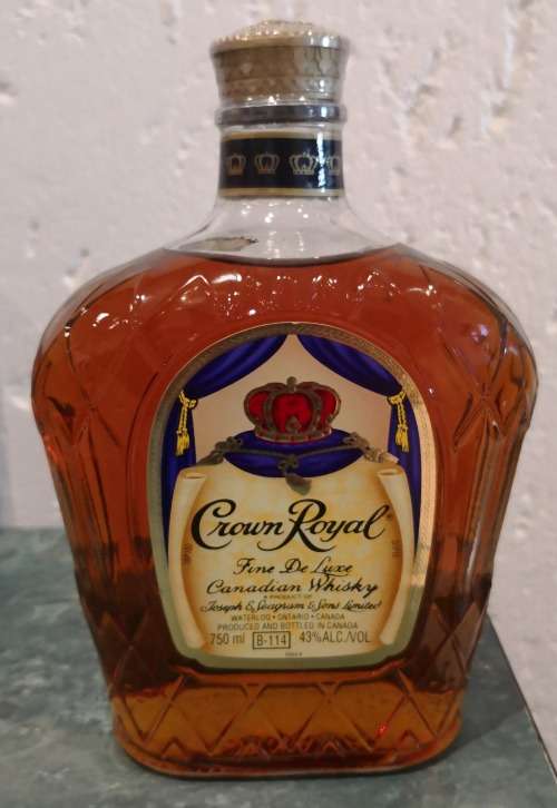 Scarce 750ml Bottle of Crown Royal Fine De Luxe Canadian Whiskey with unique Royal Purple Sack