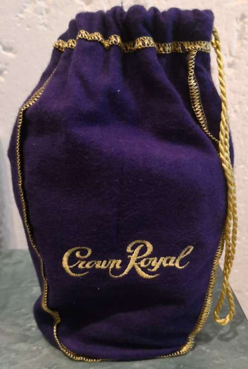 Scarce 750ml Bottle of Crown Royal Fine De Luxe Canadian Whiskey with unique Royal Purple Sack