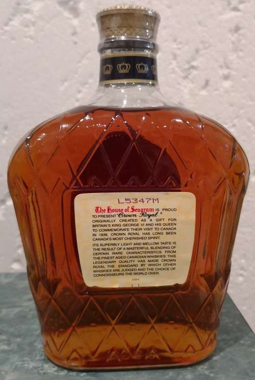 Scarce 750ml Bottle of Crown Royal Fine De Luxe Canadian Whiskey with unique Royal Purple Sack