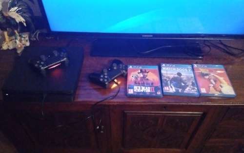 Sony PlayStation 4 Slim 1Tb, with 2 Bluetooth Wireless Controllers and 9 Games