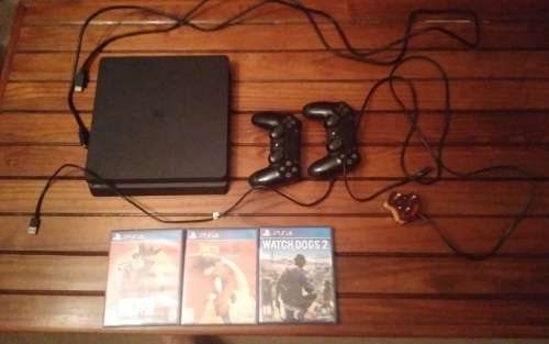Sony PlayStation 4 Slim 1Tb, with 2 Bluetooth Wireless Controllers and 9 Games
