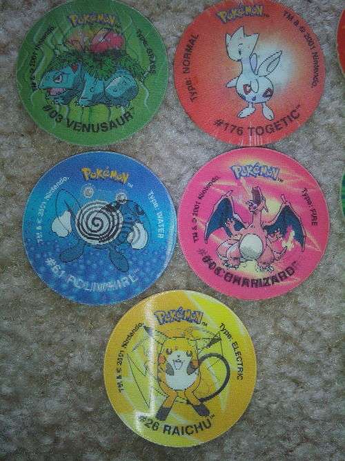 Pokemon Bundle (Tazos, Limited Edition Album & Pokemon Play it Disc)