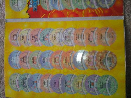 Pokemon Bundle (Tazos, Limited Edition Album & Pokemon Play it Disc)