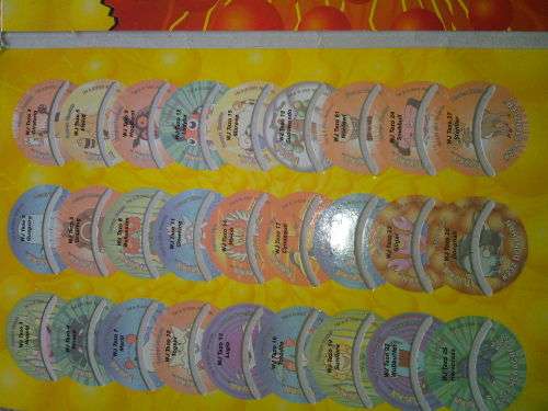 Pokemon Bundle (Tazos, Limited Edition Album & Pokemon Play it Disc)