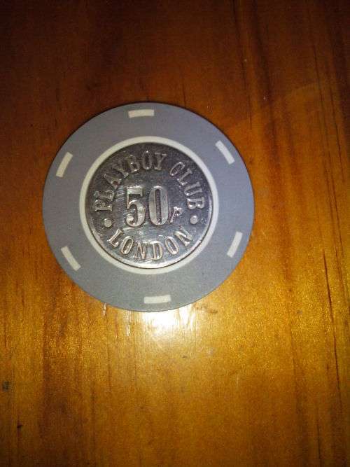 Vintage Playboy Club London casino chip - 50p metal centre