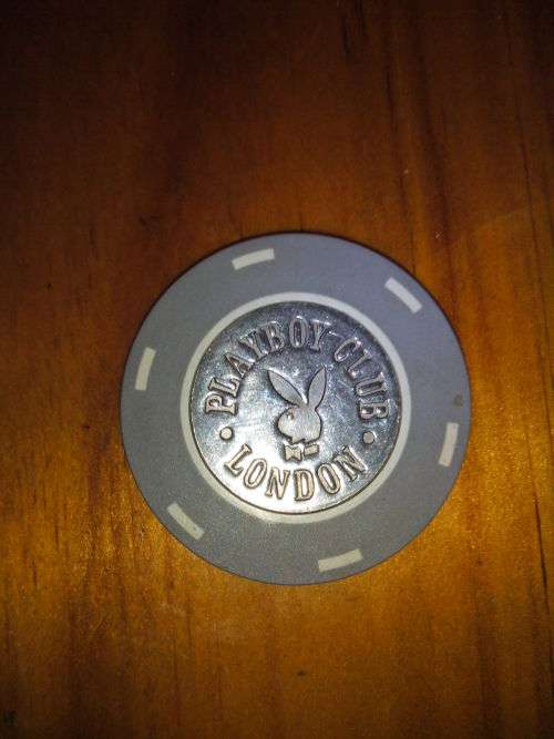 Vintage Playboy Club London casino chip - 50p metal centre