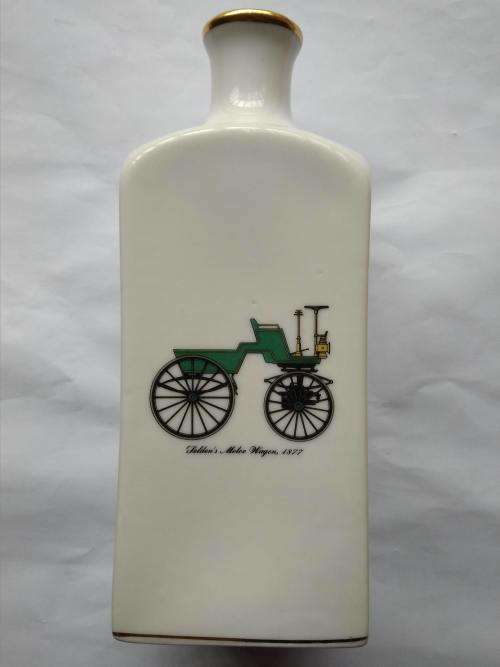 Unusual White vase / ornament with vintage vehicles