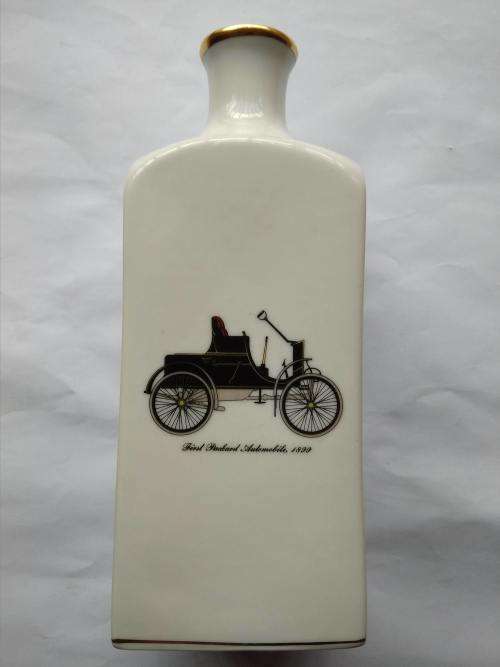 Unusual White vase / ornament with vintage vehicles