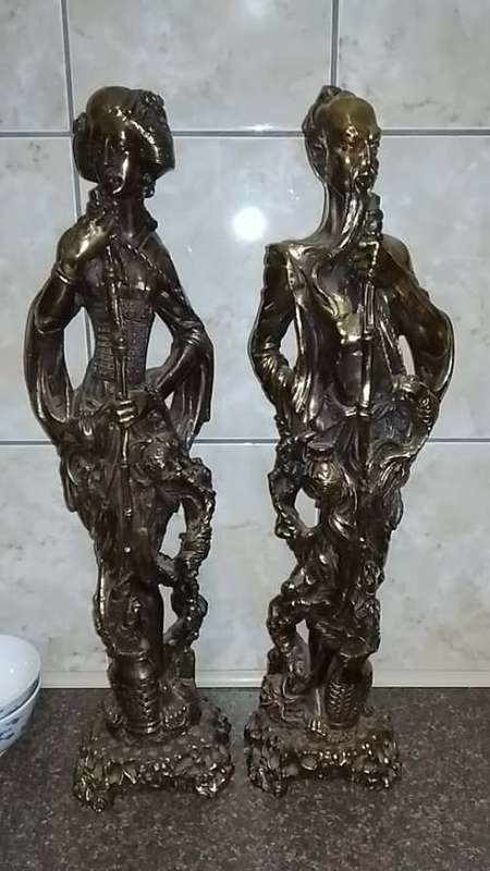 A pair of metal China/ Chinese statue ornaments