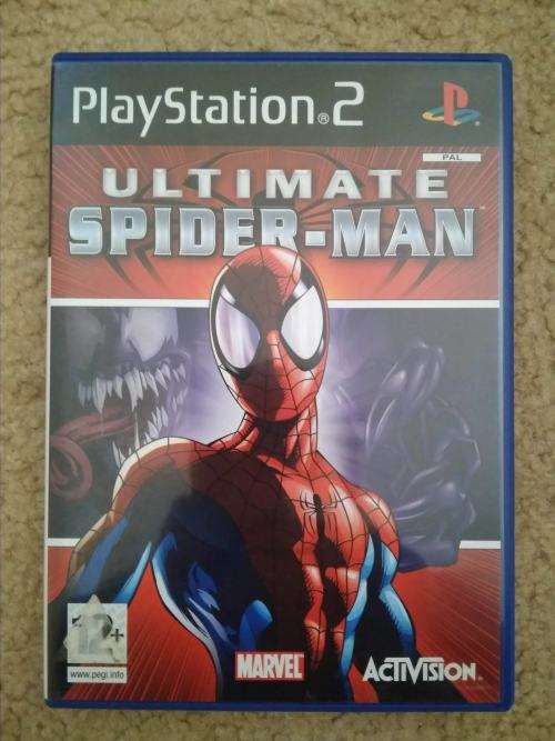 Ultimate Spider-Man PS2 disc and manual