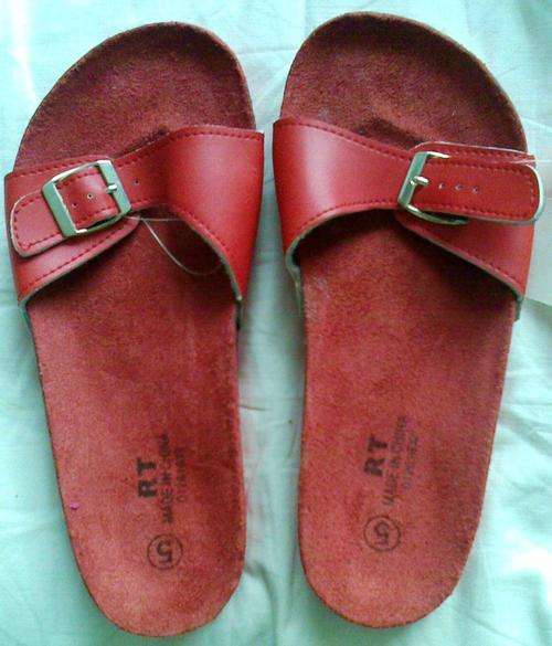 Pair red flat shoes (size 5)