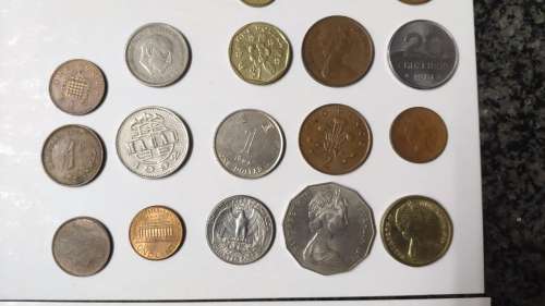 Lot of old SA coins, international coins, and tokens - all circulated - incl Jonty Rhodes