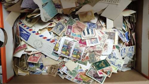 Shoe box full of stamps from all over the world