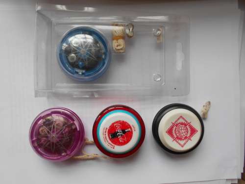 4 Yoyos including Coca Cola, Future Kids, Ballistics Pro-Yo collection x 2