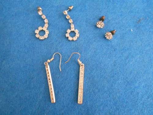 3 pair of faux diamond earrings