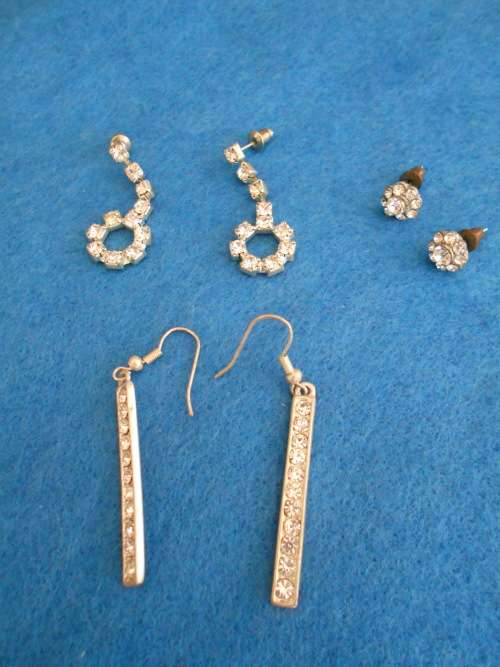 3 pair of faux diamond earrings