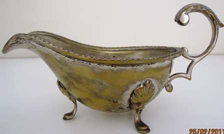 Heavy Silver plated gravy boat ...in need of restoration