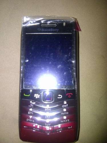 RELISTED DUE TO NON PAYMENT,LIMITD ED BLACK /RED ,9105 BLACKBERRY PEARL. FREE 2GIG CARD!!!!!