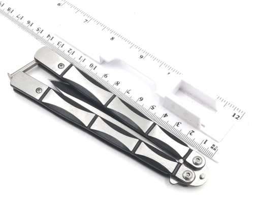 `Flutter Blade: The Elegance of the Butterfly Knife`