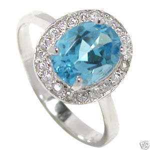 9K SOLID WHITE GOLD BLUE TOPAZ AND WHITE TOPAZ RING!! 3.240CTS!