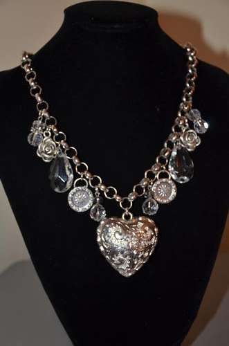 Silver heart with charms and beads on chain
