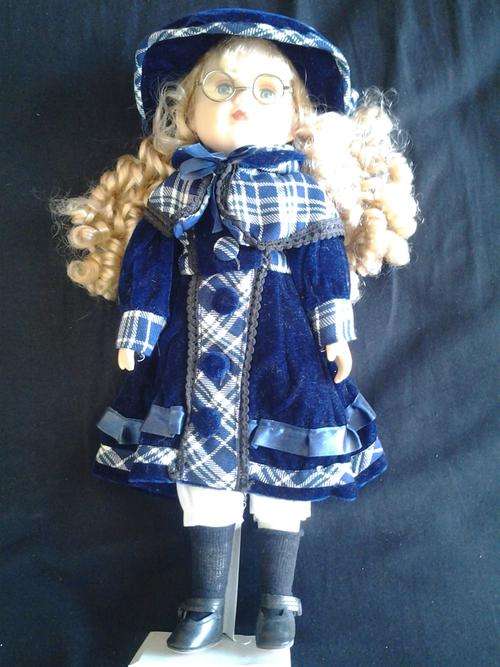 Doll with glasses