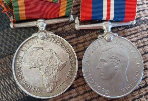 2 X WW2 MEDALS ISSUE TO J.F SMIT 194097 SILVER AFRICA SERVICE AND DEFENCE MEDAL