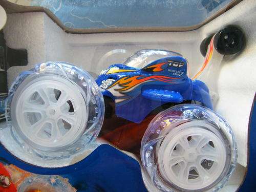 HUGE REMOTE CONTROL STUNT CAR!!! DOES BACKFLIPS, 360 DEGREE TURNS AND LOTS MORE