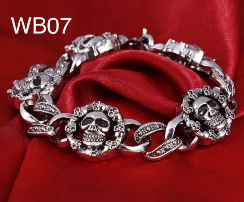WB07 - MEN/WOMAN WRIST BAND S/STEEL - 21CM/MULTI SKULLS