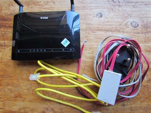 D-LINK MODEM ADSL TELKOM +POWER SUPPLY AND CONNECTING CABLES