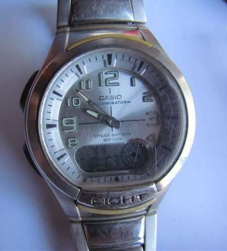 CASIO Illuminator + Tin + Booklet - See Pics