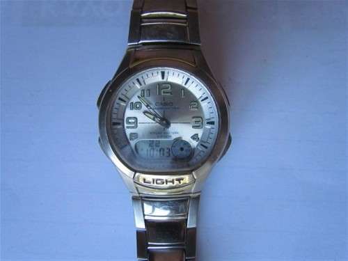 CASIO Illuminator + Tin + Booklet - See Pics