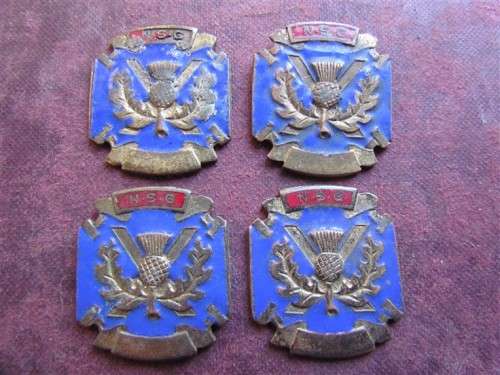 4 X NSG THISTLE BADGES - 1 BID FOR ALL