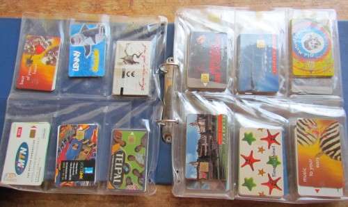 210 X VINTAGE TELEPHONE CARDS COLLECTION IN ALBUM