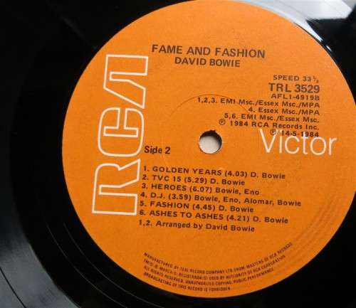 David Bowie Fame & Fashion -Vintage Vinyl LP Cover damaged & LP scratched see pics