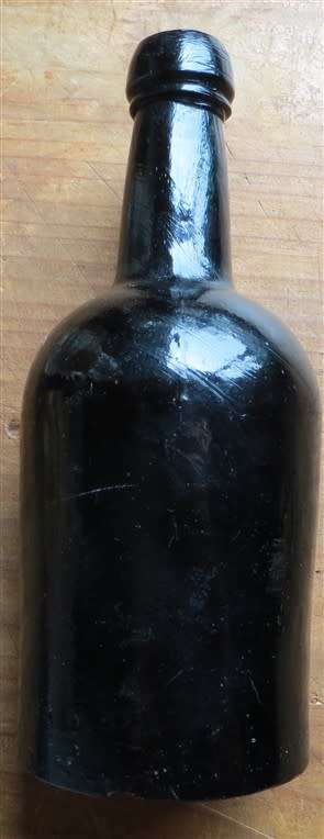 Antique Dark Glass Bottle - Joining seam lines visible
