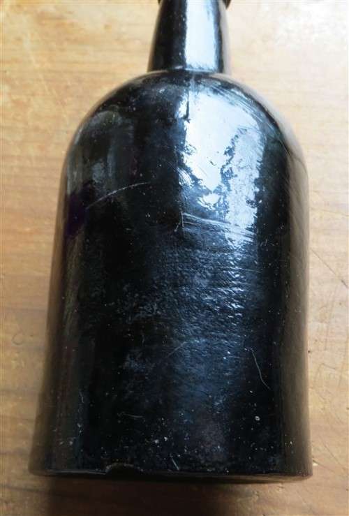 Antique Dark Glass Bottle - Joining seam lines visible