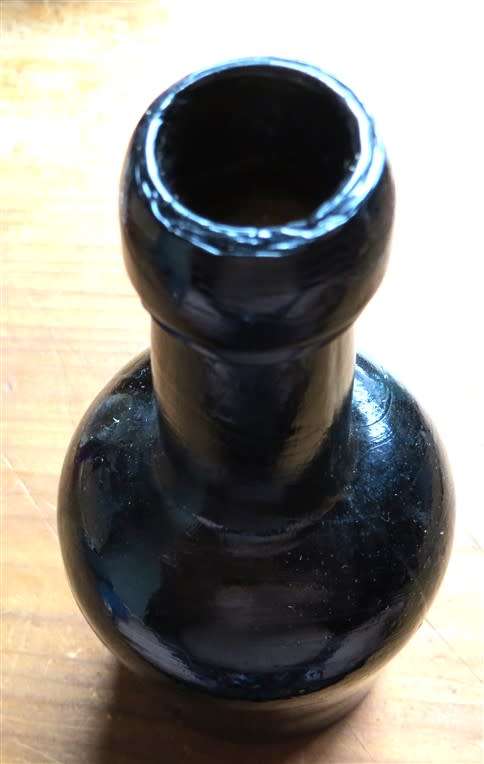Antique Dark Glass Bottle - Joining seam lines visible