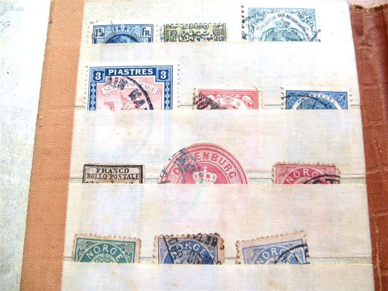 Small Pocket Album with Older World Stamps