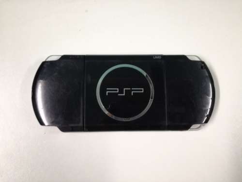 PSP + Charger + Memory Card + Games