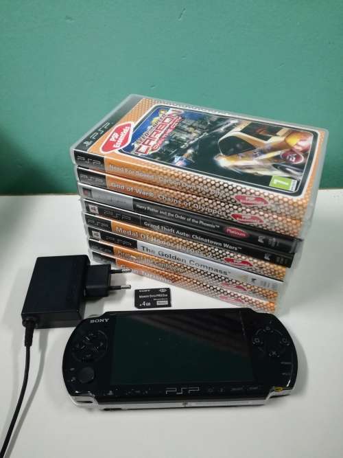 PSP + Charger + Memory Card + Games