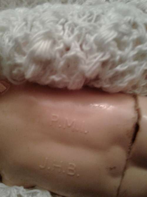 P.M.I J.H.B Doll