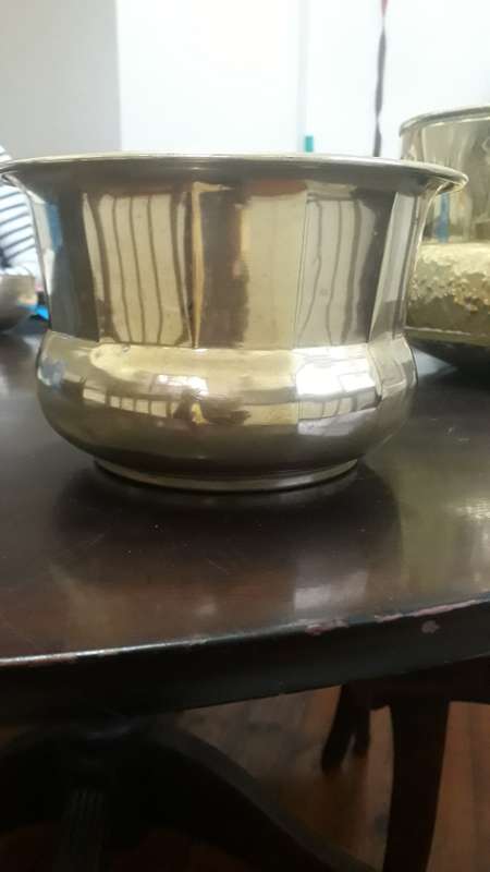 A brass planter in good condition